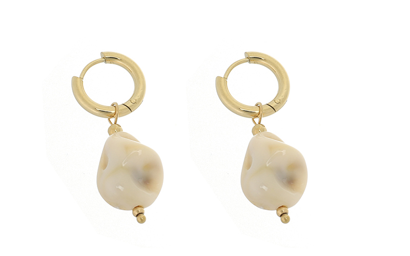 Boucles d'Oreilles Natural Tori en situation
