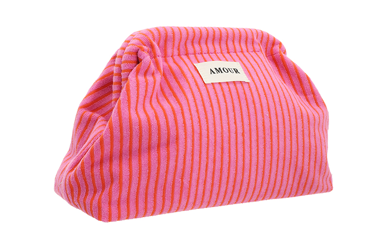 Fuchsia Clutch Millau in use