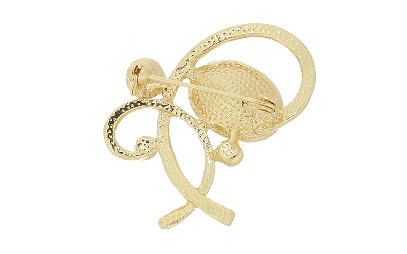 Broche Swirl Champagne Celosia en situation