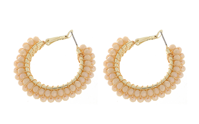 Boucles d'oreilles Fem Champagne en situation